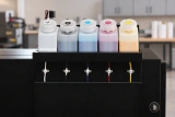Colibri DTF ULTIMA R620 — ink supply detail in a clean production workshop