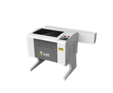 Enclosed laser machine viewed from the front and right side