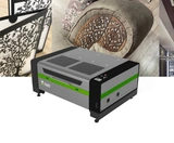 Laser equipment promotional composite with example decorative or marked sample imagery